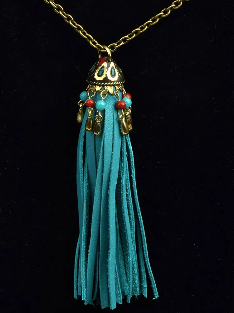 24" Turquoise Tassel Necklace, fabric gift bag, leather fringe with antique gold charmed cap on gold chain, handmade in USA, Each