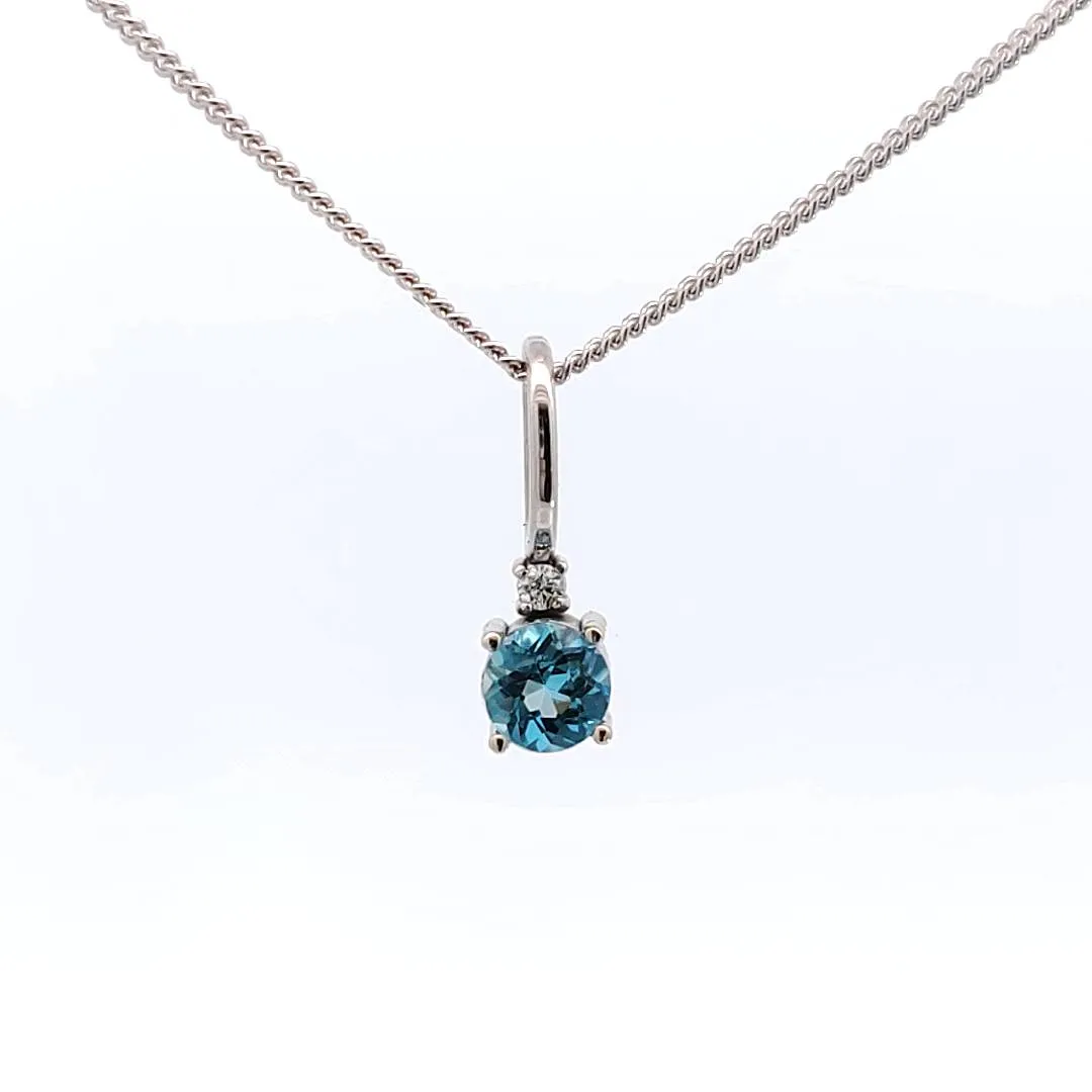 Dainty aquamarine and diamond pendant