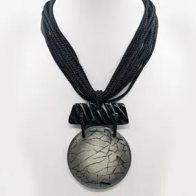 Luxury Statement necklace with resin disc & horn components on multi cord